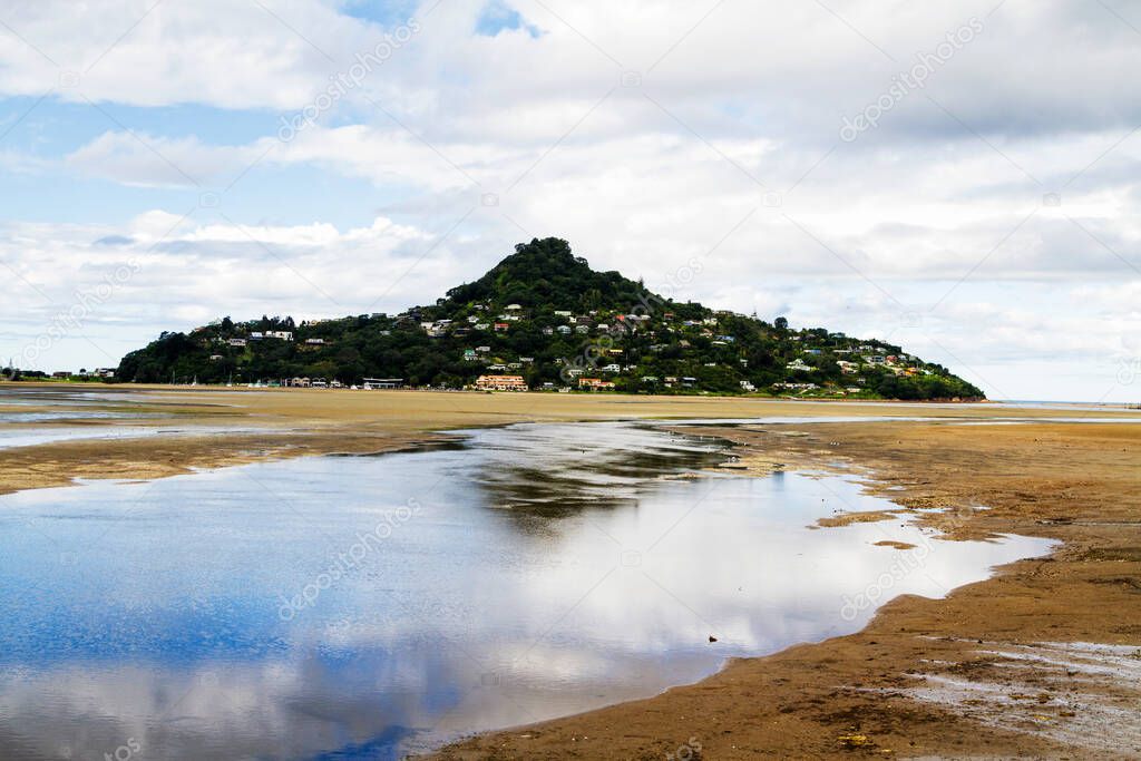 Aerial view of a picturesque bay on Coromandel Peninsula during low tide, North Island, New Zealand