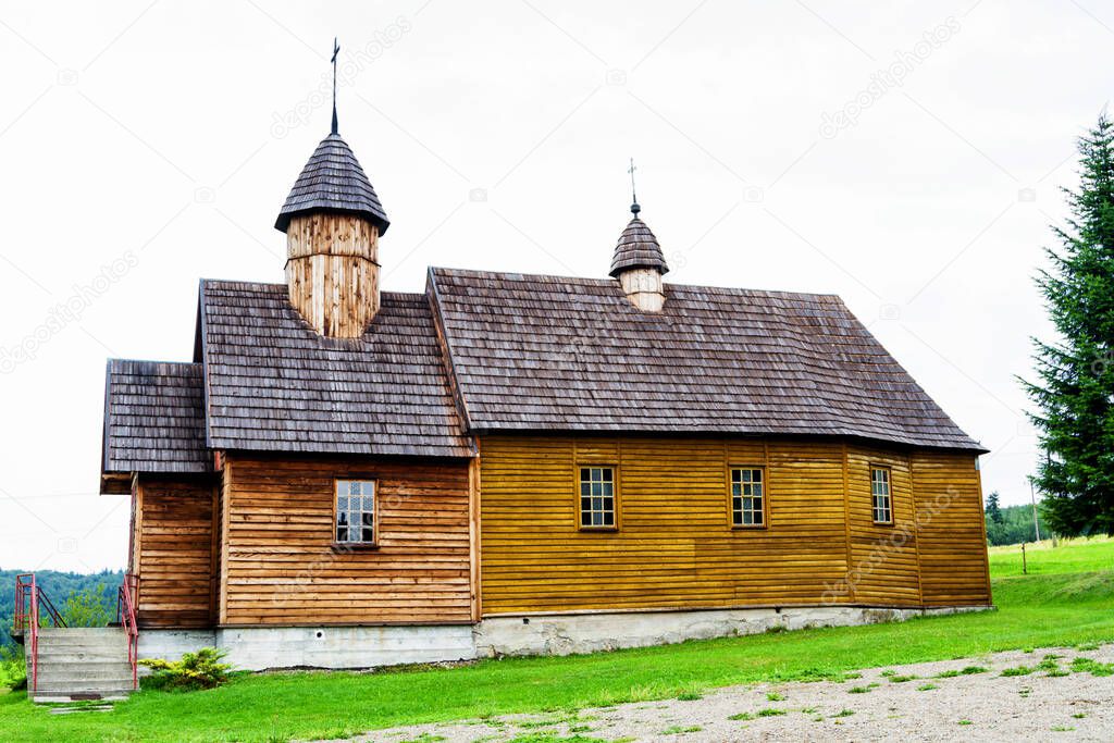 Beautiful ancient wooden greek catholic church listed on UNESCO in Beskid Niski mountain range, Poland