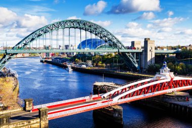 NEWCASTLE UPON TYNE, ENGLAND - OCTOBER 28, 2017: Classic view of the Iconic Tyne Bridge spanning the River Tyne between Newcastle and Gateshead, United Kingdom clipart
