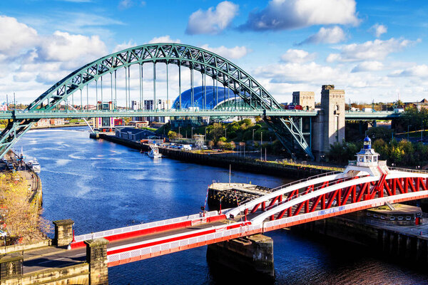 NEWCASTLE UPON TYNE, ENGLAND - OCTOBER 28, 2017: Classic view of the Iconic Tyne Bridge spanning the River Tyne between Newcastle and Gateshead, United Kingdom