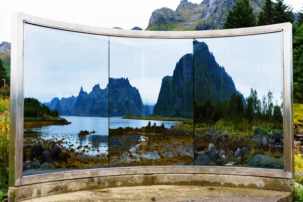 Concrete-glass-steel mirror reflects surrounding fjord-mountains. , Nordland, Norway