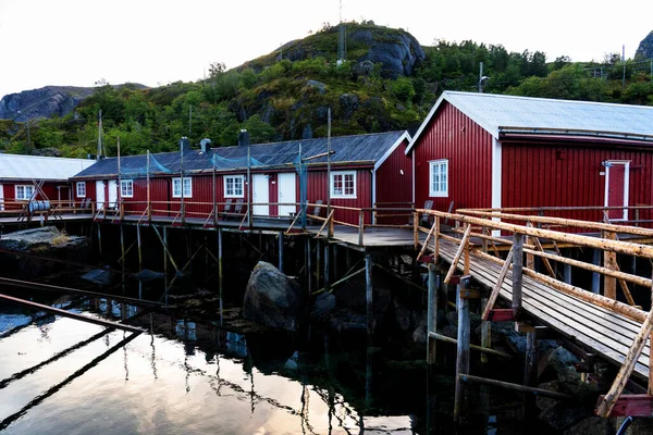 Nusfjord Harbor Colorful Red Fishing Houses Sailing Boat Peaceful Evening — стоковое фото