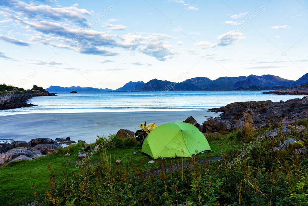HENNINGSVAER, NORWAY - SEPT 10, 2019. Lonely tent set up by the sea in Lofoten archipelago, Norway