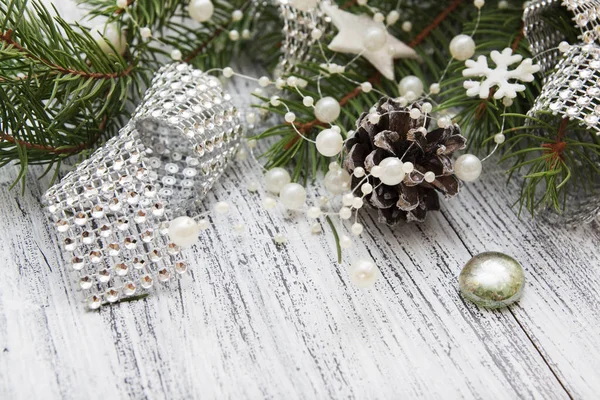 New Year and Christmas background with pine branches, beads and — Stock Photo, Image