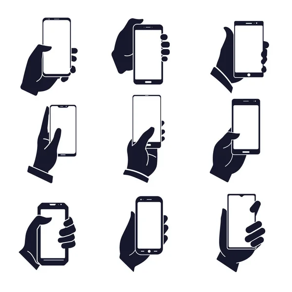Smartphone dans des silhouettes isolées à la main, appareil mobile et position de la main — Image vectorielle