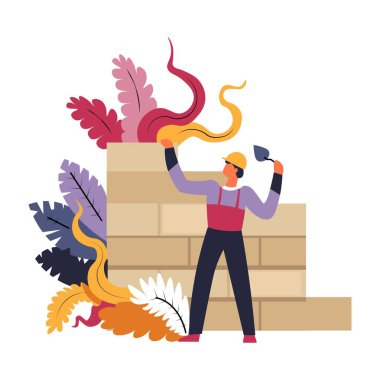 İnşaatta tuğla döşeyen duvarcı ustası.