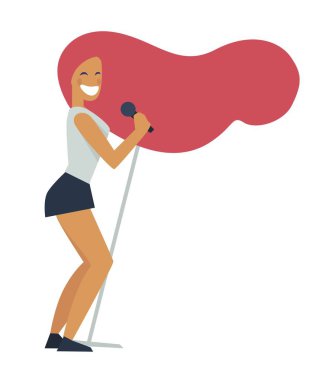 Kızıl saçlı genç kadın sahnede mikrofonla şarkı söylüyor.