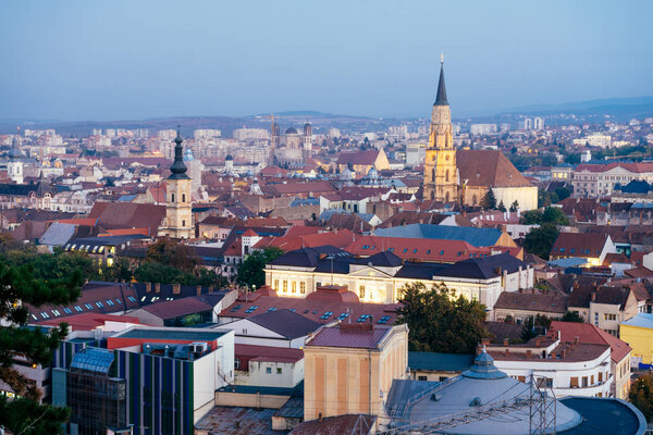 Elevated view Cluj-Napoca city at Night. Cluj-Napoca, a city in northwestern Romania, is the unofficial capital of the Transylvania region. It's home to universities, vibrant nightlife and landmarks. 