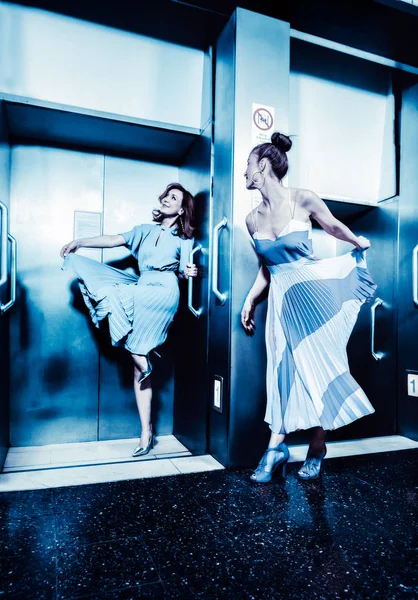 Dark Color Toned Picture Two Fashionable Sexy Girl Elevator Paternoster — Stock Photo, Image