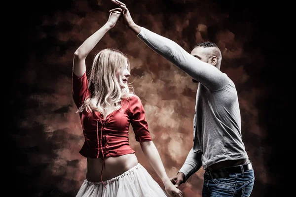 Young and saxy couple dances Caribbean Salsa — Stock Photo, Image