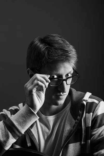 Young mans portrait. Close-up face against gray background — Stock Photo, Image