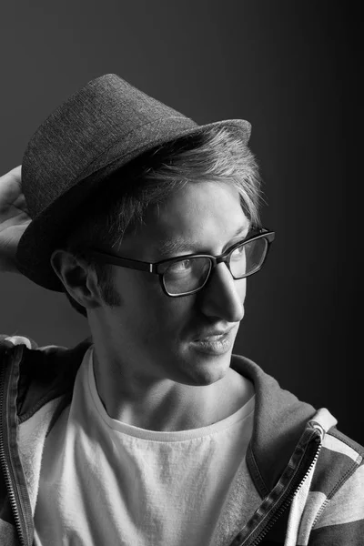 Young mans portrait. Close-up face against gray background — Stock Photo, Image