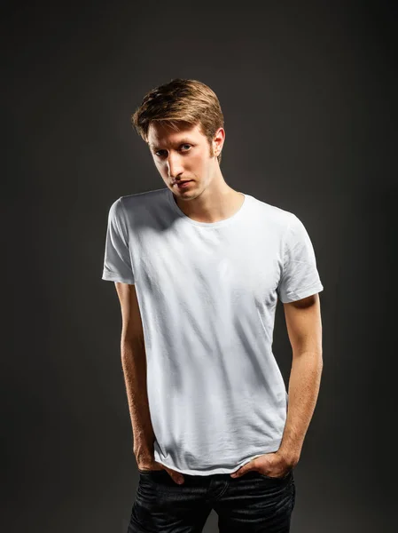 Young mans portrait. Close-up face against gray background — Stock Photo, Image