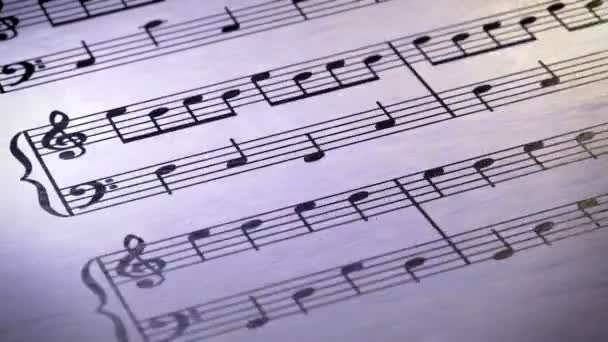 Pagina Met Muzikale Noten Looping — Stockvideo