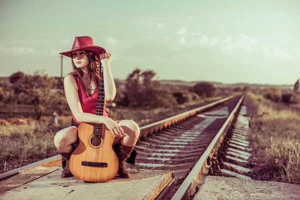 Young Cowgirl Sitting Acoustic Guitar Countrysude Railways Sunset — Stock Photo, Image