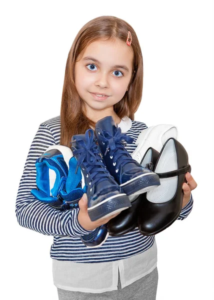 Het Meisje Houdt Meerdere Paren Schoenen Geïsoleerd Witte Achtergrond — Stockfoto