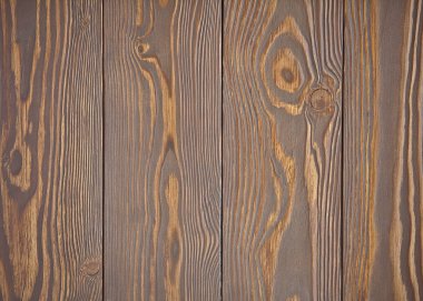 Ahşap dokusu kahverengidir kurullarının dikey düzenleme. Ahşap arka plan.