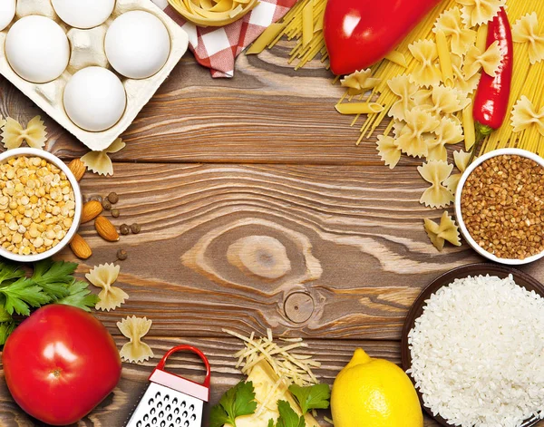 A set of natural products with semi-finished products lie around on a wooden table — Stock Image Set Natural Products Semi Finished Products Lie Wooden Table Stock Image