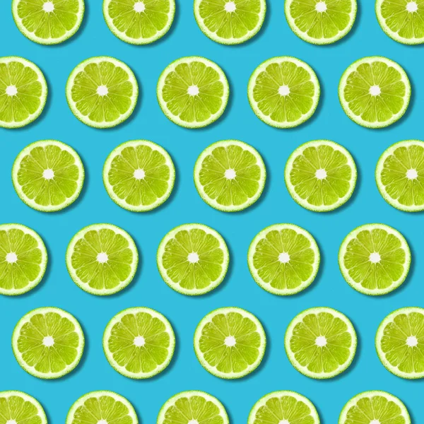 Motif Tranches Citron Vert Sur Fond Couleur Turquoise Vif Texture — Photo