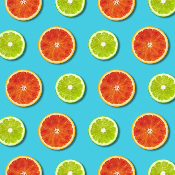 Vibrant Red Orange Green Lime Lemon Slices Pattern Turquoise Color — Stock Photo, Image