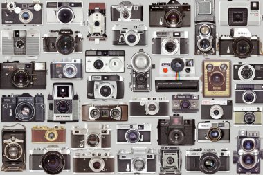 Gri arka planda eski Vintage Fotoğraf Kamera Seti ve koleksiyonu