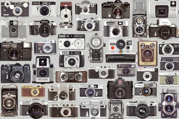 Old vintage photo camera set and collection on gray background — Stock Photo, Image