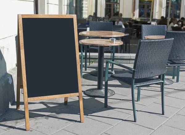 Empty restaurant menu blackboard on the street