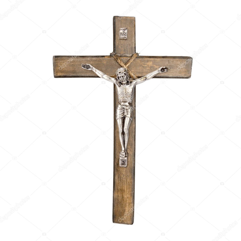 Old wooden Christian crucifix of Jesus Christ isolated on white background
