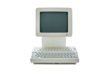 Entegre monitör ve klavye beyaz arkaplanda izole edilmiş seksenlerden klasik masaüstü bilgisayarı. Retro canlandırma biçimi ön görünümü