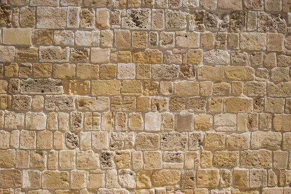 在塞浦路斯的砂岩 石灰石老墙壁 黄色石墙背景 关闭视图与详细信息 — 图库照片