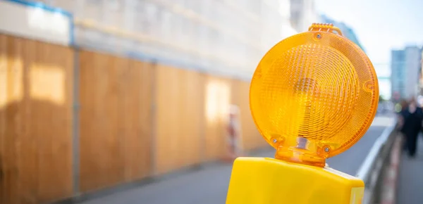 Road Construction Concept Orange Reflector Warning Light Protects Drivers Blur — Stock Photo, Image