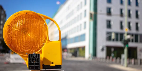 Road Construction Concept Orange Reflector Warning Light Protects Drivers Blur — Stock Photo, Image