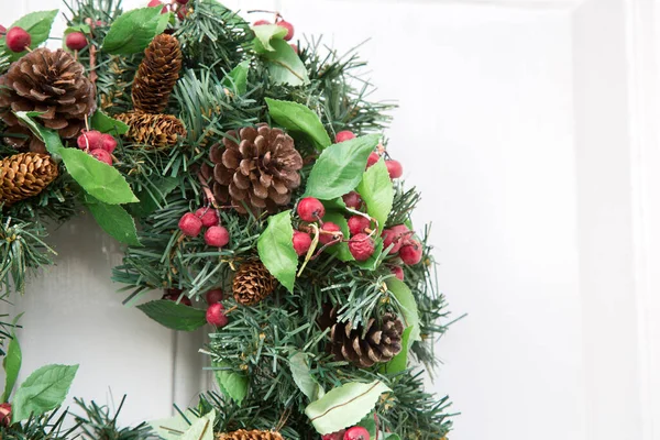 Green Natural Christmas Wreath on  White Door