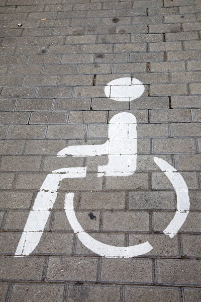Simbolo Disabilitato Sulla Superficie Ciottoli — Foto Stock