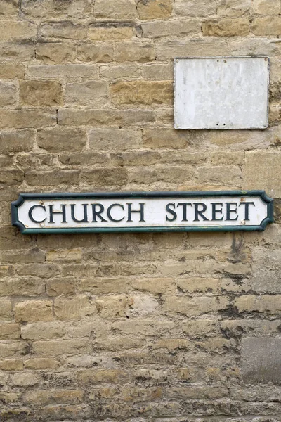 Church Street Road Sign Stone Wall — Stock fotografie