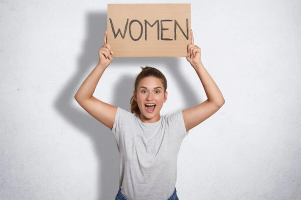 Happy Young European Lovely Feminist Dressed Casual Grey Shirt Holds — Stock Photo, Image