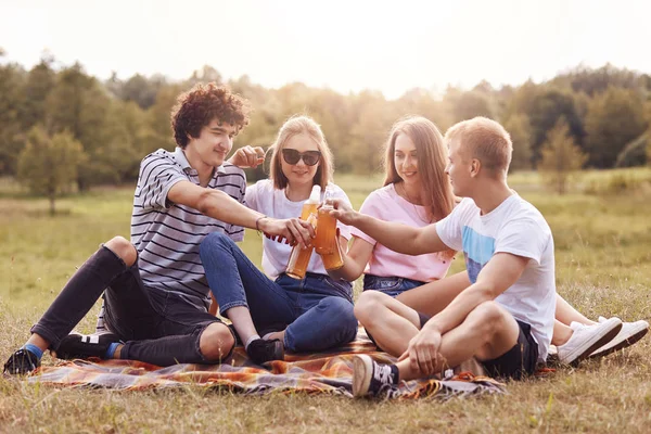 Happy Company Friends Clink Bottles Cold Cider Beer Sit Close — Stock Photo, Image