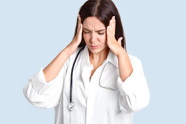 Stressful Female Family Doctor Suffers Headache Keeps Palms Temples Closes — Stock Photo, Image