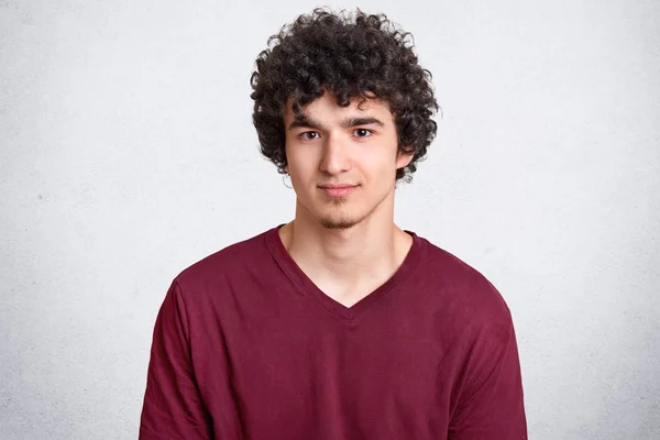 Headshot Attractive Curly Youngster Looks Seriously Camera Has Appealing Look — Stock Photo, Image