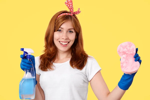 Cheerful Young Female Housemaid Wears Casual Shirt Headband Holds Washing — Stock Photo, Image