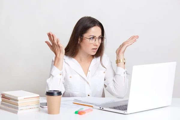 Puzzled Emotive Woman Has Deadline Task Gesture Frustration Stares Bugged Royalty Free Stock Images