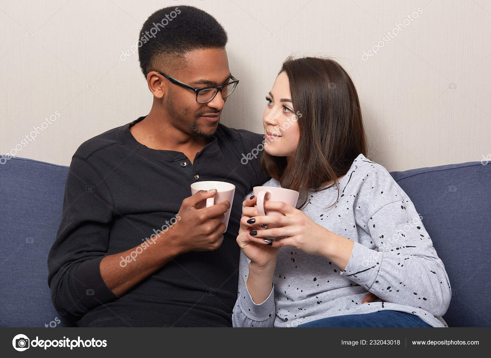 Horizontal Shot Lovely Multiethnic Girlfriend Boyfriend Drink Coffee Tea  Together Stock Photo by ©Sementsova321 232043018