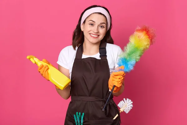 Pleased European Woman Dressed Casual Shirt Apron Hair Band Holds — Stock Photo, Image