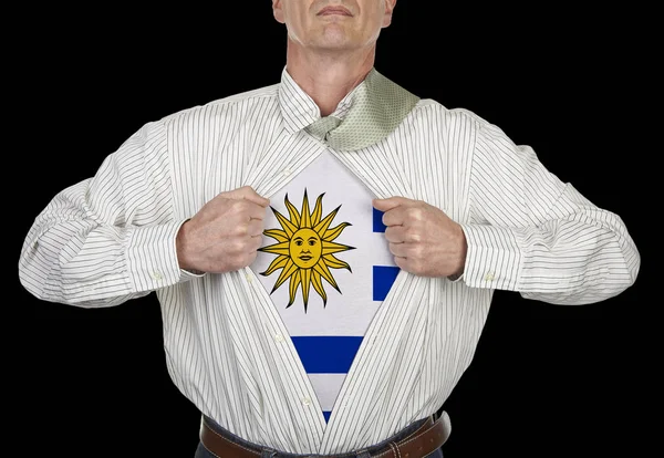 Бизнесмен Костюме Супергероя Флагом Уругвая Стоит Черном Фоне — стоковое фото