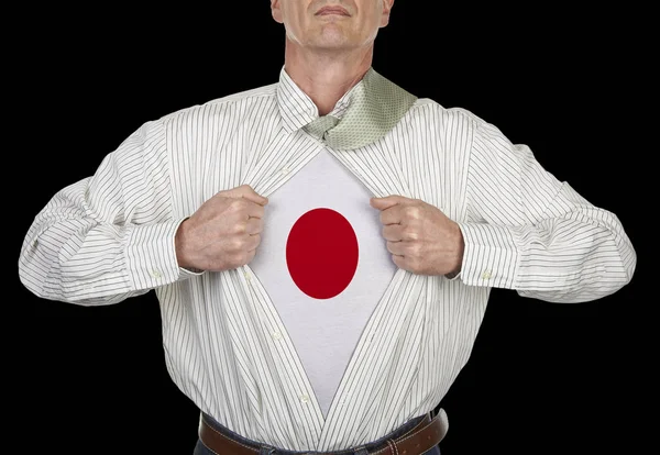Бизнесмен Показывает Костюм Супергероя Японским Флагом Стоящий Черном Фоне — стоковое фото