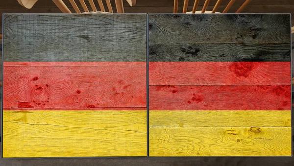 ドイツは レストランのラップトップで木製のテーブルのフラグ — ストック写真