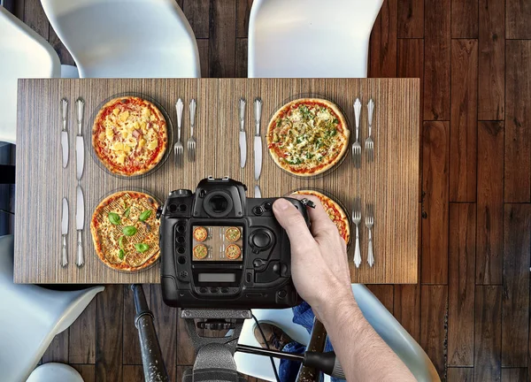 Photographer Taking Pictures Four Different Pizza Wooden Table — Stock Photo, Image