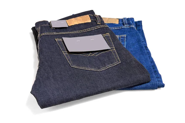 Lacivert ve açık mavi dokulu kot pantolon etiketli kot — Stok fotoğraf