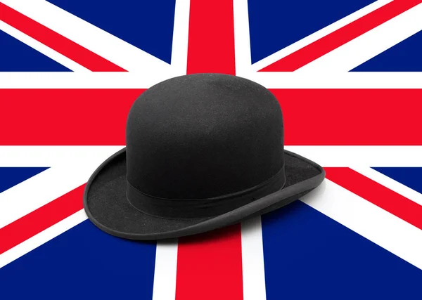 Um elegante chapéu de jogador preto na bandeira do Reino Unido — Fotografia de Stock
