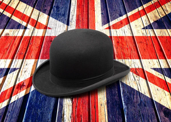 Eine stylische schwarze Melone auf britischer Flagge — Stockfoto